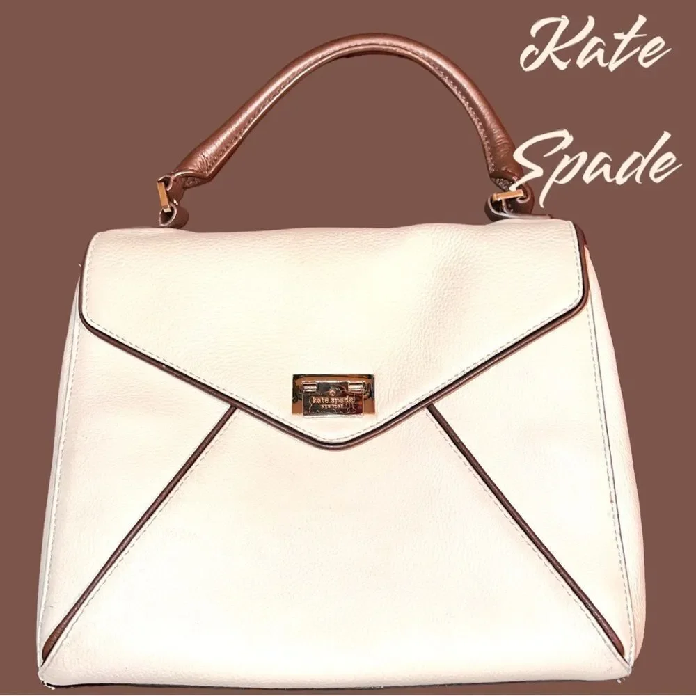 Kate Spade envelope purse. Cream with brown trim . Euc!